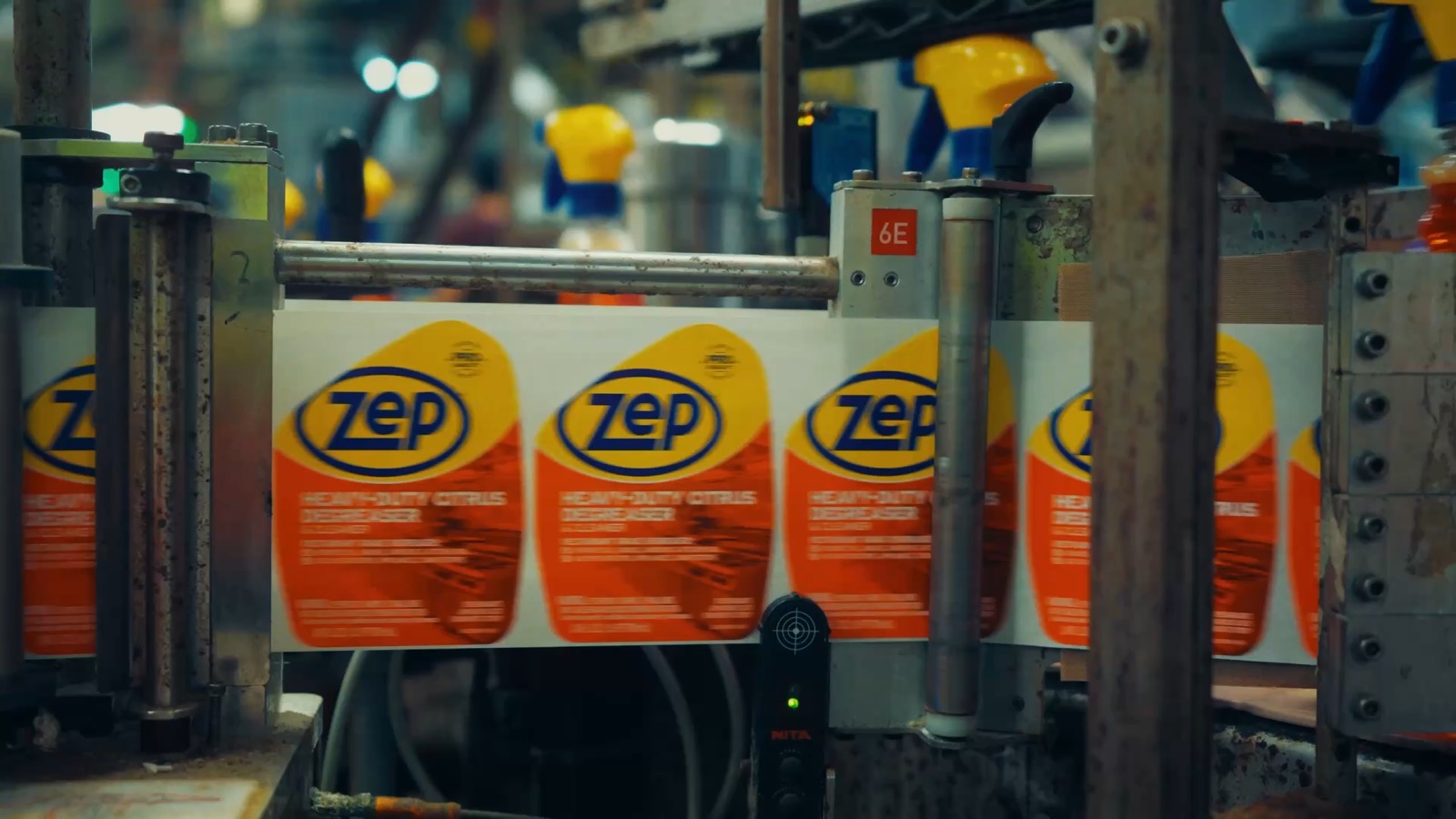 Labelled Zep bottles moving along the line